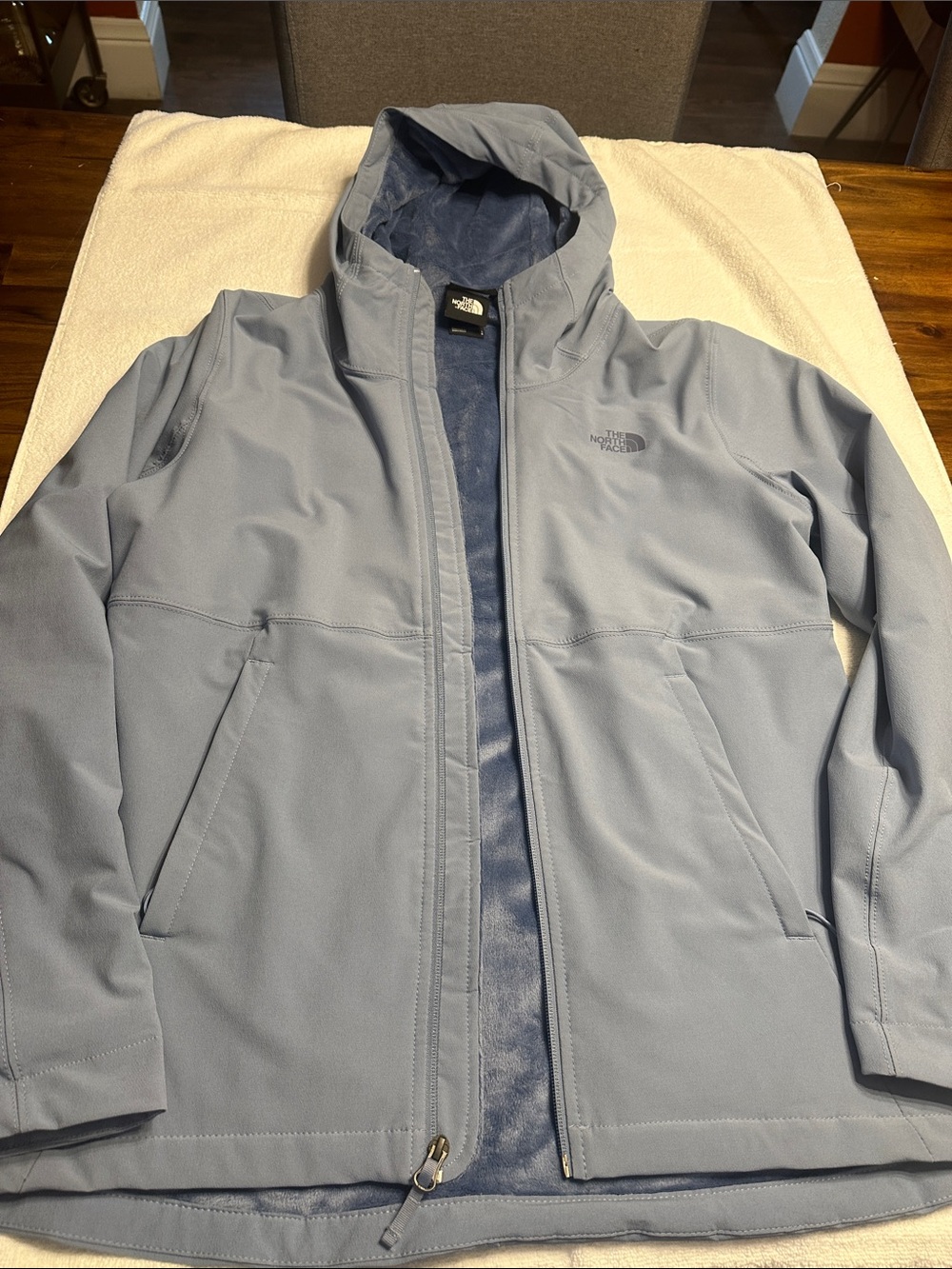 The North Face Women’s Light Blue Hooded Raincoat Jacket